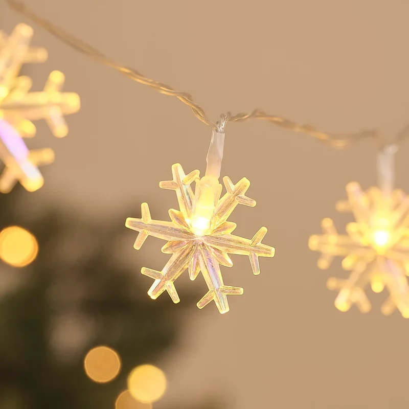 Warmweiße LED-Lichterkette mit 20 irisierenden Schneeflocken