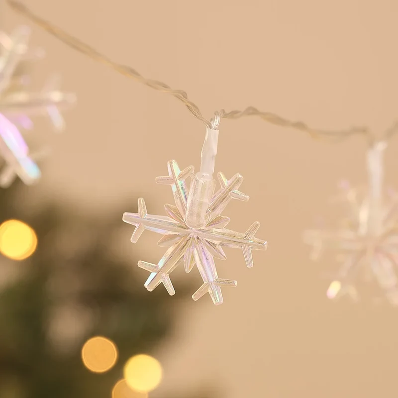 Warmweiße LED-Lichterkette mit 20 irisierenden Schneeflocken