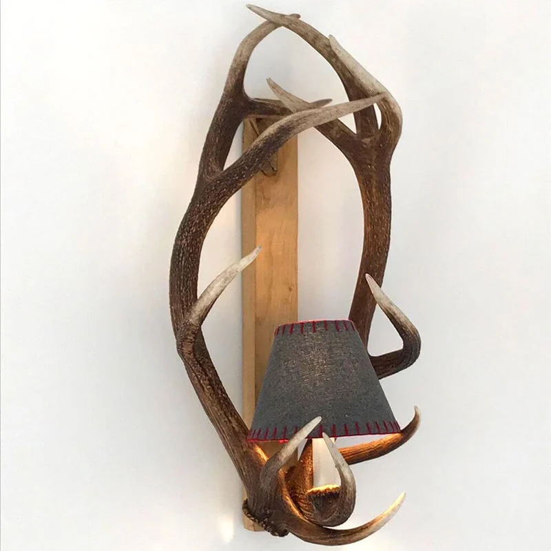Extravagante Chalet Geweih Wandlampe